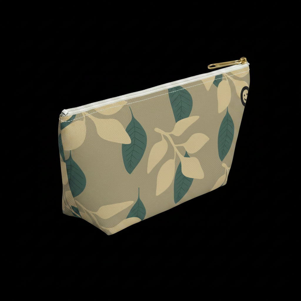 Cosmetic bag with leaf pattern on a beige background