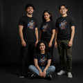 Five people wearing black blooomit novelty t-shirts with colorful graphics and text, sitting indoors.