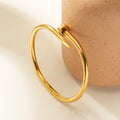Gold Twisted Nail Bracelet - BlooomiT